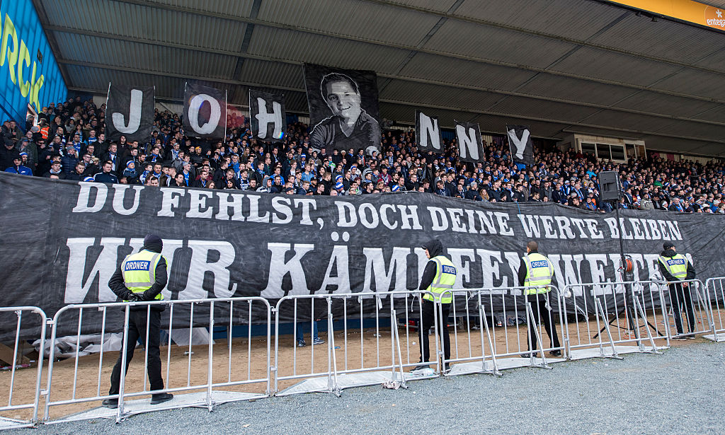 DARMSTADT, GERMANY - MARCH 12: The Fans of Darmstadt 98 show banner in memory of Johnny, a fan of Darmstadt 98 who died on wednesday during the first bundesliga match between SV Darmstadt 98 and FC Augsburg at Merck-Stadion am Boellenfalltor on March 12, 2016 in Darmstadt, Germany. (Photo by Alexander Scheuber/Bongarts/Getty Images)