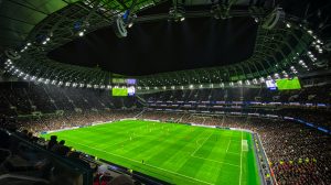 people sitting on stadium seats